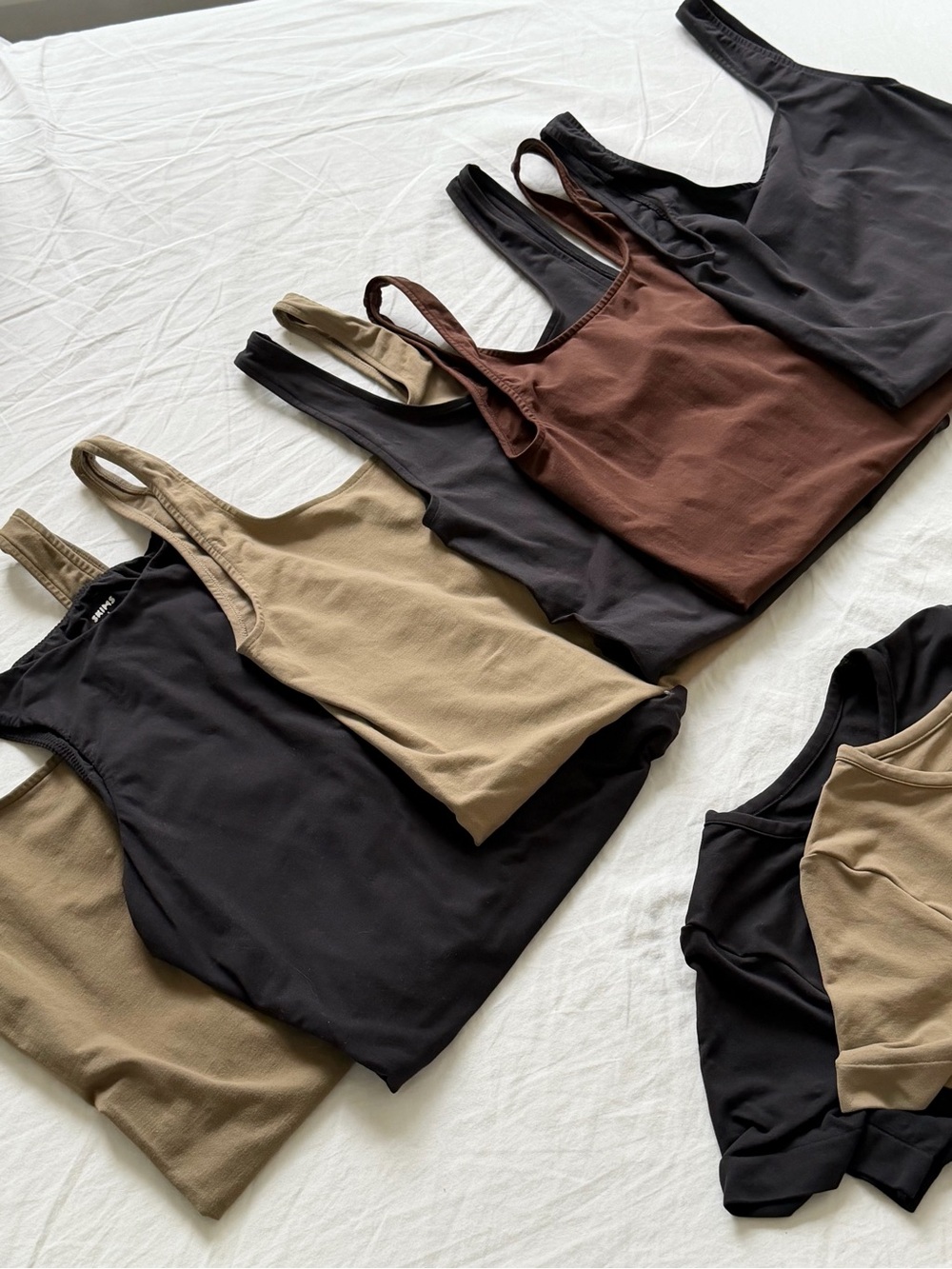 6 SKIMS Bodysuits (XS/S)